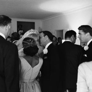 Jack Entratter back to camera Frank Sinatra and Peter Lawford at Sammy Davis Jrs wedding to May Britt 11131960