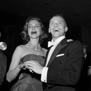 Frank Sinatra and Lauren Bacall making a personal appearance for a fundraising event 07021955