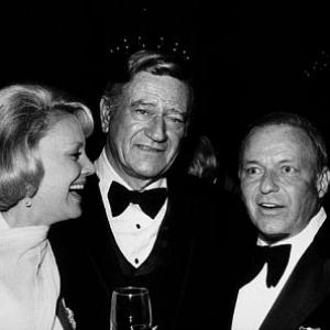 John Wayne Barbara Marx and Frank Sinatra at the Scopus Award ceremony honoring John Wayne December 1977