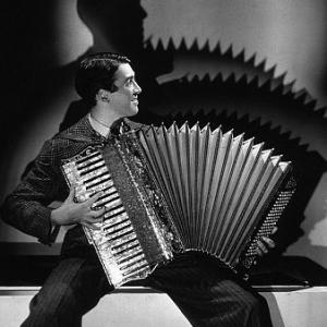 James Stewart playing the accordian, 1936. Modern silver gelatin, 14x11, estate stamped. $600 © 1978 Ted Allan MPTV