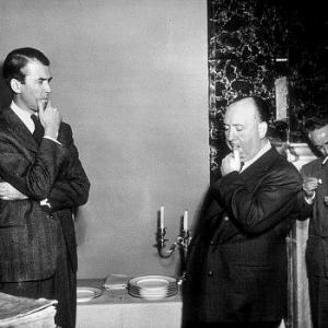 Alfred Hitchcock on teh set of Rope wit J Stewart 1948 Warner Bros