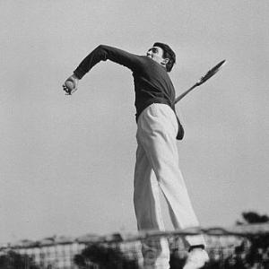 James Stewart jumping in mid-air with a racket, 1936. Vintage silver gelatin, 13x10, estate stamped. $1200 © 1978 Ted Allan MPTV