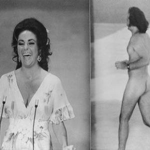 Academy Awards  46th Annual Elizabeth Taylor on stage to present an Oscar shortly after a streaker Robert Opal dashed across the stage