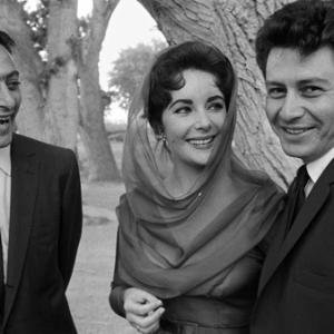 Elizabeth Taylor and Eddie Fisher on their wedding day in Las Vegas with best man Mike Todd Jr
