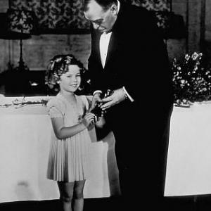 Shirley Temple at the 7th Annual Academy Awards with Irvin S Cobb