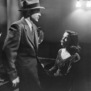 Still of Gene Tierney and Mark McPherson in Laura 1944