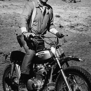 John Wayne on a motorcycle for 