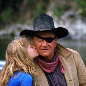 Rooster Cogburn Universal 1974 John Wayne and his daughter Marissa during a break from filming