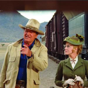 Still of John Wayne and Ann-Margret in The Train Robbers (1973)