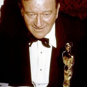 Academy Awards 42nd Annual John Wayne with Oscar 1970