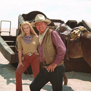 Still of John Wayne and AnnMargret in The Train Robbers 1973