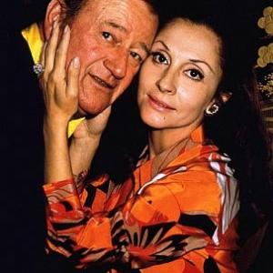 John Wayne and his wife Pilar at home 1970