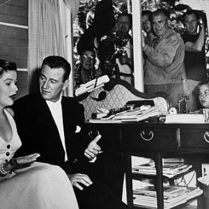John Wayne and Nancy Olson during the filming of Big Jim McLain Warner Bros 1952