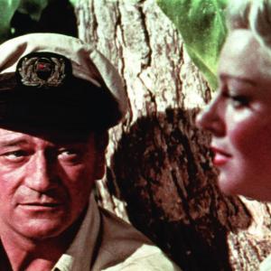 Still of John Wayne and Lana Turner in The Sea Chase 1955