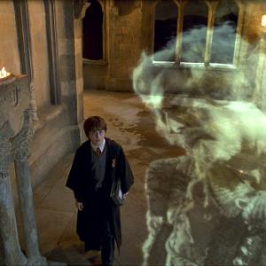 (L-r) Harry Potter (DANIEL RADCLIFFE) encounters Nearly Headless Nick (JOHN CLEESE).