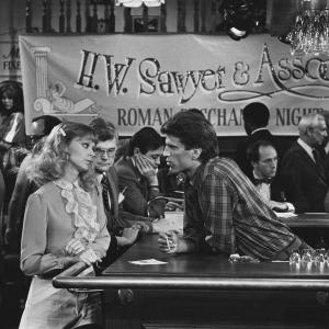 Still of John Cleese Ted Danson and Shelley Long in Cheers 1982