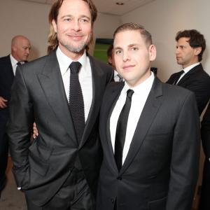 Brad Pitt and Jonah Hill at event of Zmogus, pakeites viska (2011)