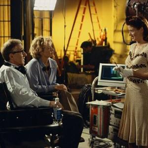 Director Val Waxman WOODY ALLEN and studio executive Ellie TA LEONI compliment Lori DEBRA MESSING on her scene in Woody Allens latest contemporary comedy HOLLYWOOD ENDING being distributed domestically by DreamWorks