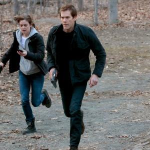 Still of Kevin Bacon and Jessica Stroup in The Following 2013