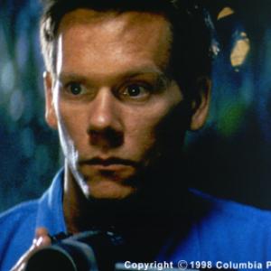 Kevin Bacon co-stars as Ray Duquette
