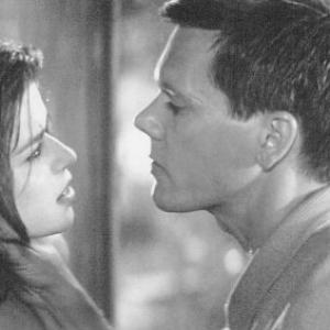 Still of Kevin Bacon and Neve Campbell in Wild Things 1998