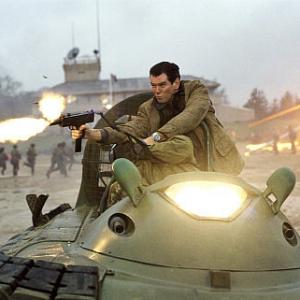 James Bond PIERCE BROSNAN fights the enemy from atop a speeding Hovercraft