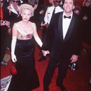 Patricia Arquette and Nicolas Cage at event of The 69th Annual Academy Awards 1997