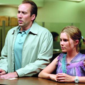 Still of Nicolas Cage and Alison Lohman in Matchstick Men (2003)