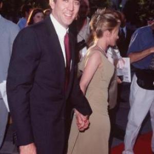 Patricia Arquette and Nicolas Cage at event of Snake Eyes 1998