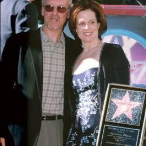 James Cameron and Sigourney Weaver