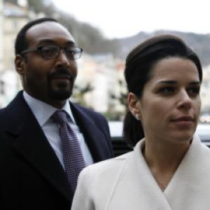 Still of Neve Campbell and Jesse L Martin in The Philanthropist 2009