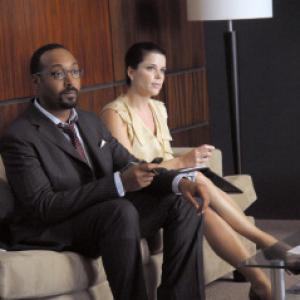 Still of Neve Campbell and Jesse L Martin in The Philanthropist 2009