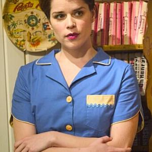 Neve Campbell as Miss Poppy