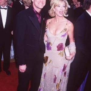 Jim Carrey and Lauren Holly at event of The 69th Annual Academy Awards (1997)