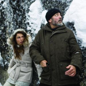 Still of George Clooney and Irina Björklund in The American (2010)