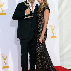 Kevin Costner and Christine Baumgartner at event of The 64th Primetime Emmy Awards 2012