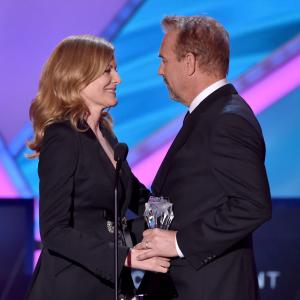 Kevin Costner and Rene Russo
