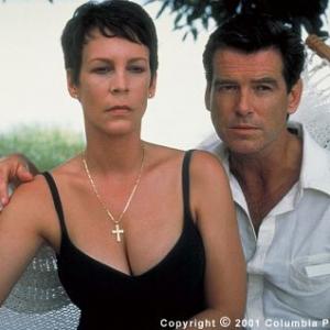 Charming but ruthless British spy Osnard Pierce Brosnan attempts to seduce Louisa Pendel Jamie Lee Curtis the wife of the Cockney excon turned tailor he is hoping to recruit