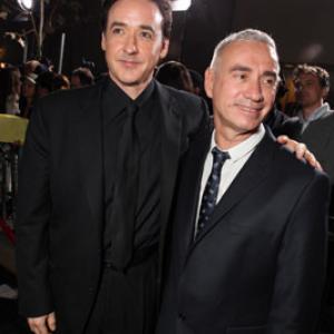 John Cusack and Roland Emmerich at event of 2012 2009