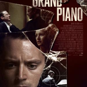 John Cusack and Elijah Wood in Grand Piano (2013)