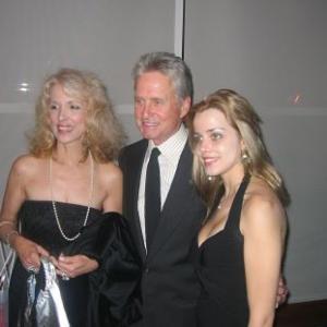 Joycelyn Engle, Michael Douglas, and Julianne Michelle at Steven Spielberg's Children at Heart Celebrity Auction/Dinner Gala.