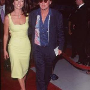 Michael Douglas and Catherine ZetaJones at event of The Muse 1999