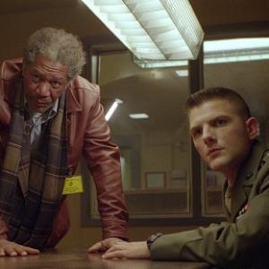 Grimes MORGAN FREEMAN and Embry ADAM SCOTT share an intense moment while preparing for a military trial