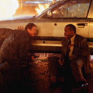 Riggs and Murtaugh try to avoid being shot