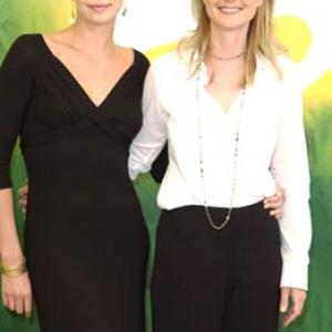 Helen Hunt and Charlize Theron at event of The Curse of the Jade Scorpion 2001