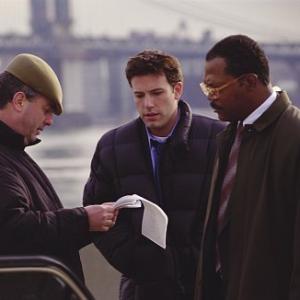 Left to right Director Roger Michell Ben Affleck and Samuel L Jackson on the set