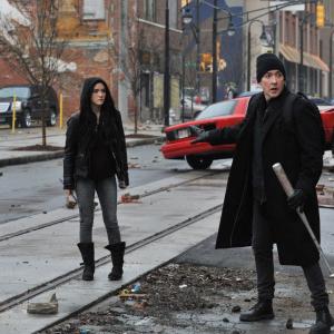 Still of John Cusack Samuel L Jackson and Isabelle Fuhrman in Cell 2016