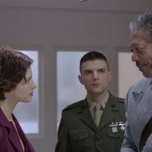 Grimes MORGAN FREEMAN cautions the defiant Claire ASHLEY JUDD to play by the military courts rules a warning Grimes himself often ignores as Embry ADAM SCOTT looks on