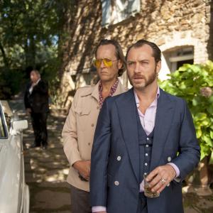 Richard E. Grant as “Dickie” and Jude Law as “Dom Hemingway” in DOM HEMINGWAY.