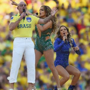 Performers Pitbull, Jennifer Lopez and Claudia Leitte perform during the Opening Ceremony of the 2014 FIFA World Cup Brazil prior to the Group A match between Brazil and Croatia at Arena de Sao Paulo on June 12, 2014 in Sao Paulo, Brazil.